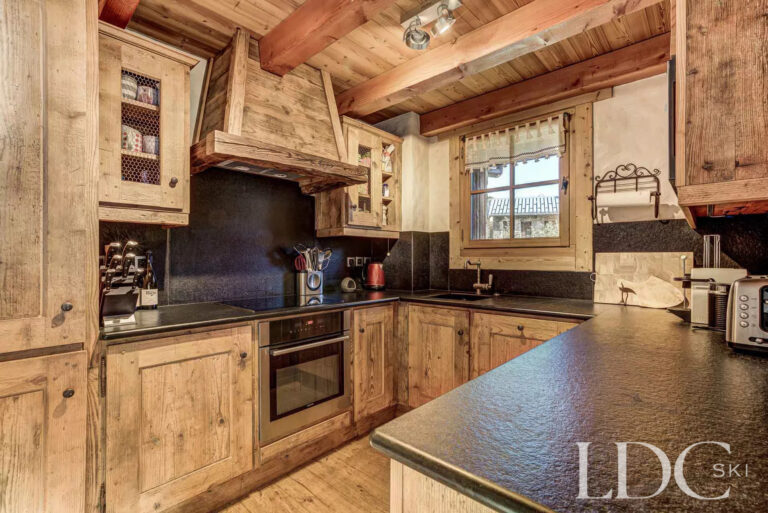 Traditional wood-finished kitchen at Nant Giraud in St Martin de Belleville