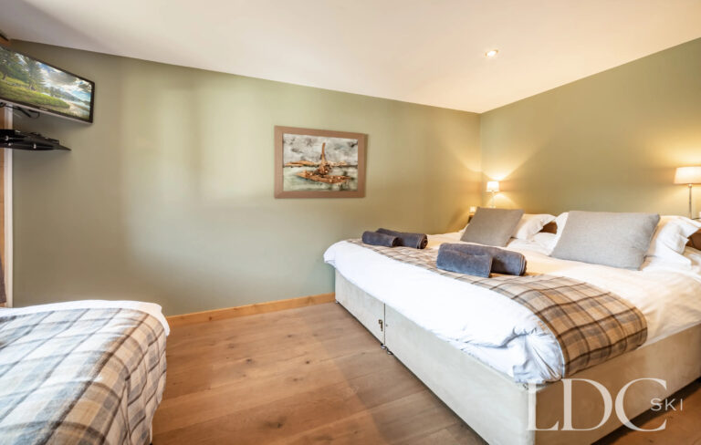 Family bedroom sleeping up to four guests at Petit Sapin in Morzine
