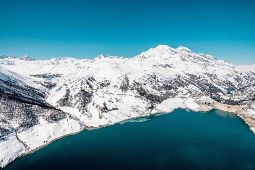Panoramic view across the lake towards the mountains at Tignes. © Andy Parant