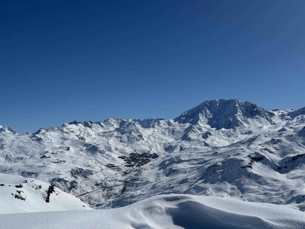 Panoramic view across the high-altitude snowy mountains above Val Thorens