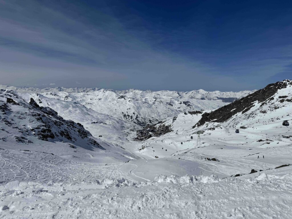 Wide view across the snow-covered mountains and ski terrain above Val Thorens