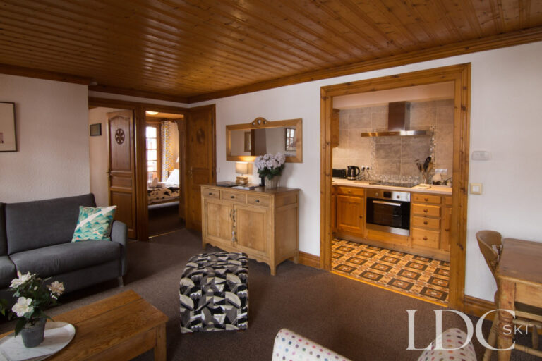 Open-plan lounge leading through to the kitchen at Violette in St Martin de Belleville